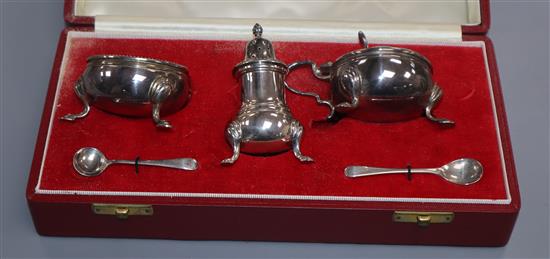 A cased modern silver three piece condiment set, Birmingham, 1971.